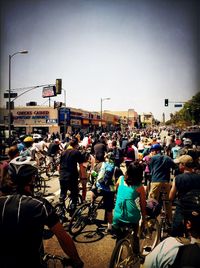 People looking at city street