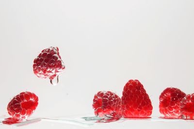 Close-up of strawberry against white background