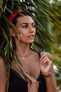 Portrait of young woman looking away