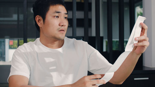 Young man looking away