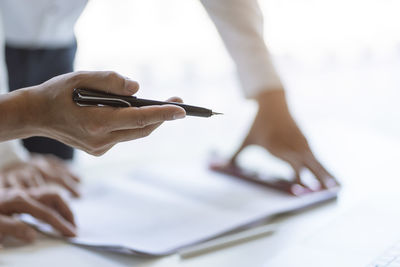 Close-up of woman using mobile phone