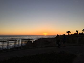 Scenic view of sea at sunset