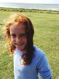 Portrait of smiling girl on beach