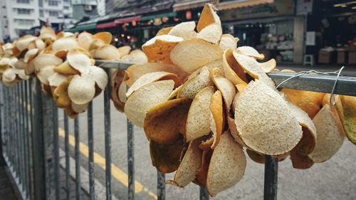 Close-up of meat on street