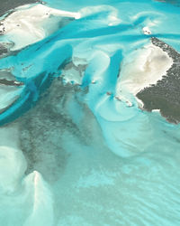 High angle view of ice floating on swimming pool