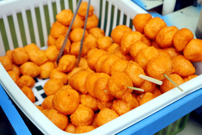 Photo of filipino street food called kwek kwek or deep fried quail eggs