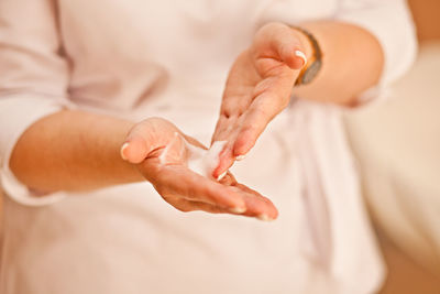 High angle view of woman holding hands