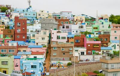 High angle view of residential buildings against sky