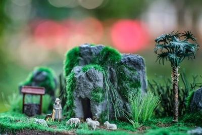 Close-up of stone stack on field