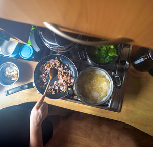 High angle view of person preparing food