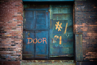 Brick wall with closed door