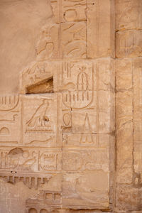 Different hieroglyphs on the walls and columns in the karnak temple.