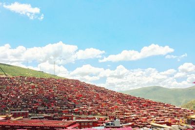 Townscape against cloudy sky