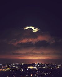 Illuminated cityscape at night
