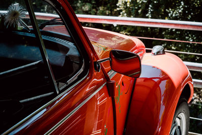 Close-up of red vintage car