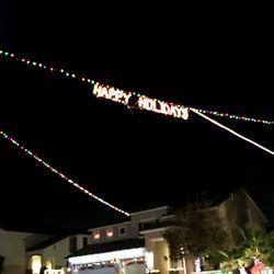 Low angle view of illuminated lights at night