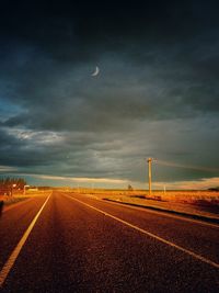 Road by land against sky