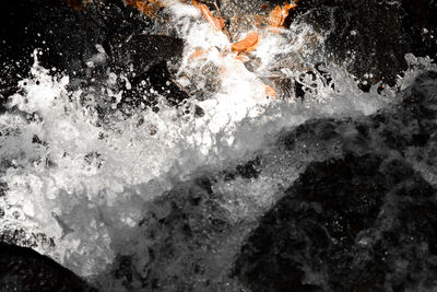 Waves splashing on rocks