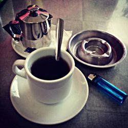 Close-up of coffee cup on table