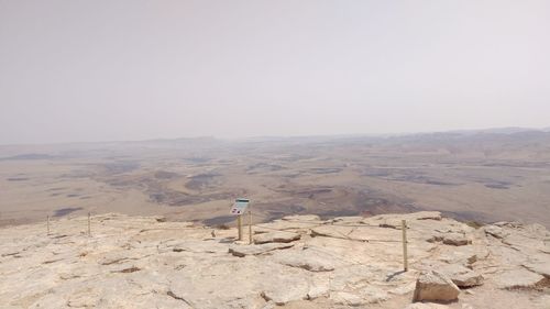 Scenic view of desert against clear sky