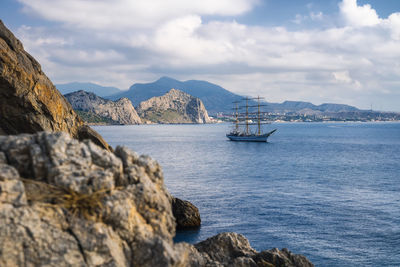 View of the sea bay and ship in the village novyi svit in the crimea in autumn