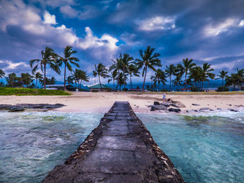 Scenic view of sea against dramatic sky