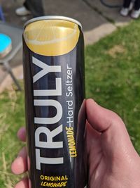 Close-up of hand holding drink