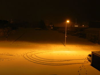 Illuminated street light at night