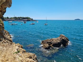 Scenic view of sea against clear blue sky