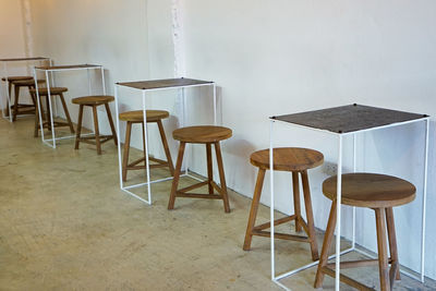 Interior design and decoration of cafe decorated with wooden furniture in industrial loft style