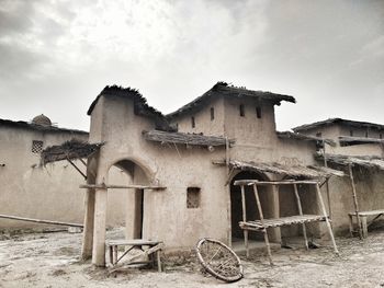 Old abandoned building against sky