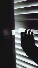 Low section of man on tiled floor