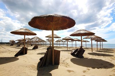 View of sun shades on beach