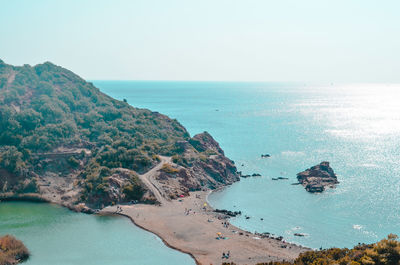 High angle view of bay against clear sky