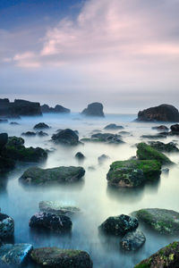 Scenic view of sea against sky during sunset