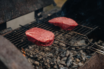 Close-up of meat on barbecue grill