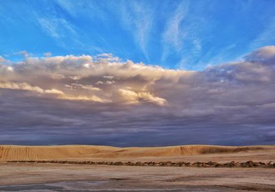 Scenic view of desert against sky