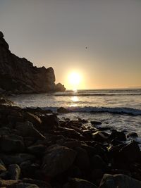 Scenic view of sea against sky during sunset