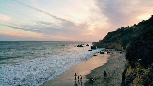 Scenic view of sea at sunset