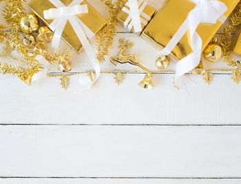 Low angle view of christmas decoration hanging on wall