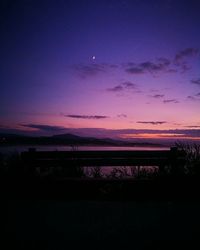 Silhouette landscape against scenic sky