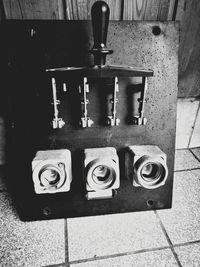 High angle view of old machine part on floor