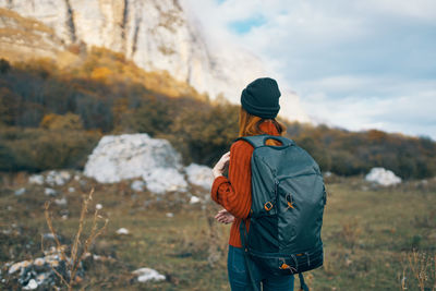 Rear view of man looking at mountain