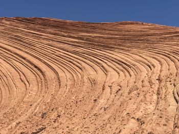 Scenic view of desert against clear sky