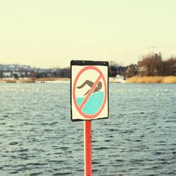 Warning sign in water