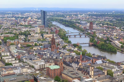 High angle view of river amidst buildings in city