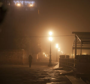 Alone in the fog in venice at night, wintertime