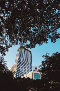 Low angle view of modern buildings against sky