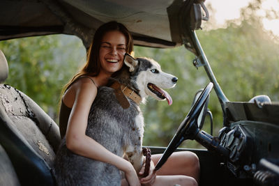 Portrait of woman with dog