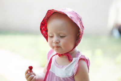 Portrait of cute girl looking away